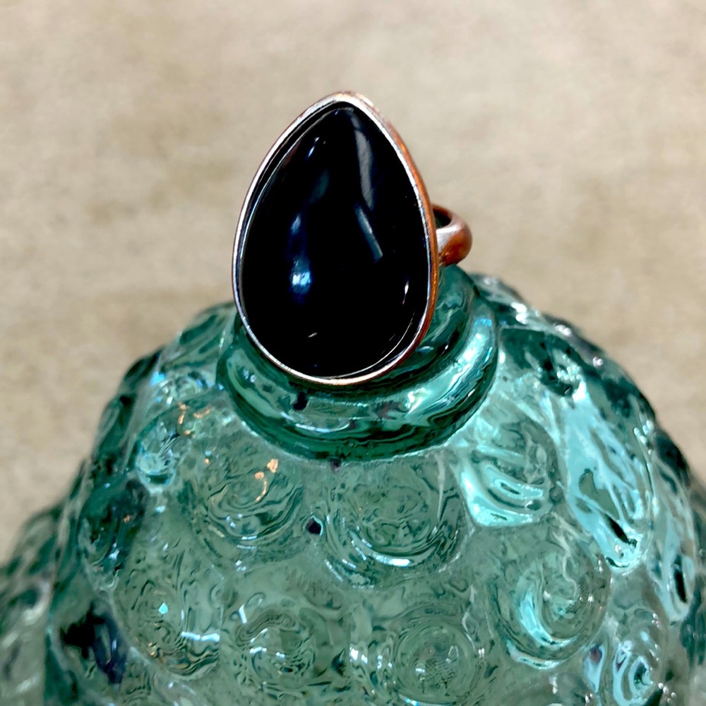 Black tear drop pear shape ring